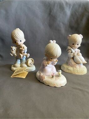 Precious Moments Three-Piece Pastel Figurine Set in Cream, Pink and Blue